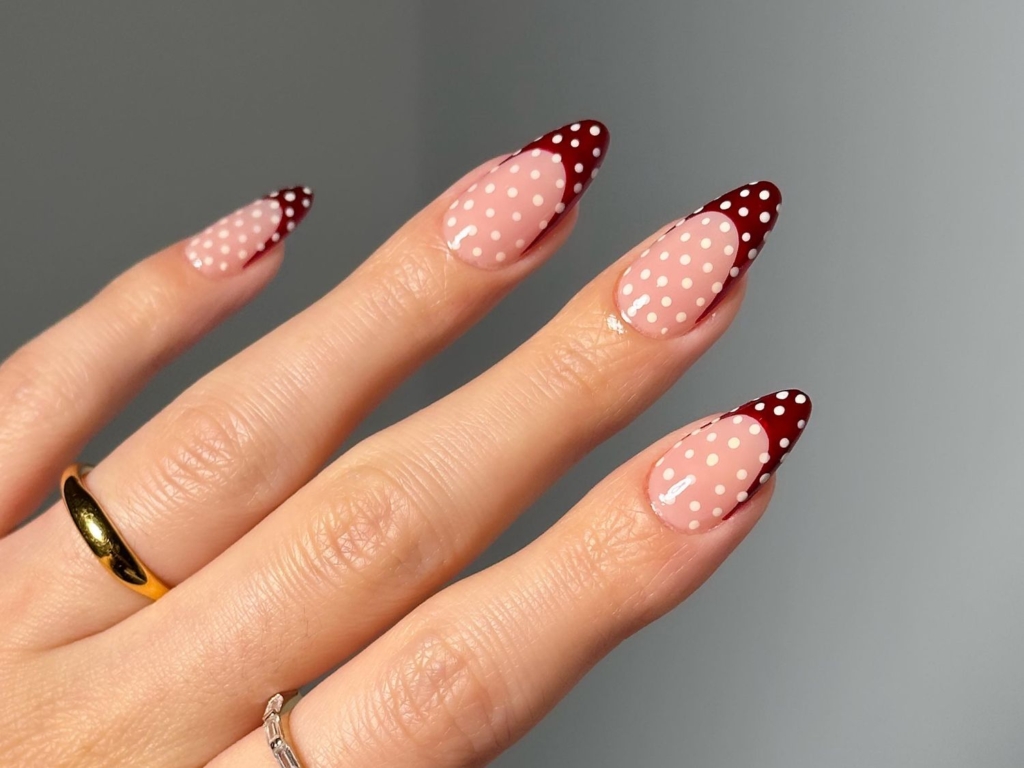 A view of maroon polka dot nails A view of maroon polka dot nails
