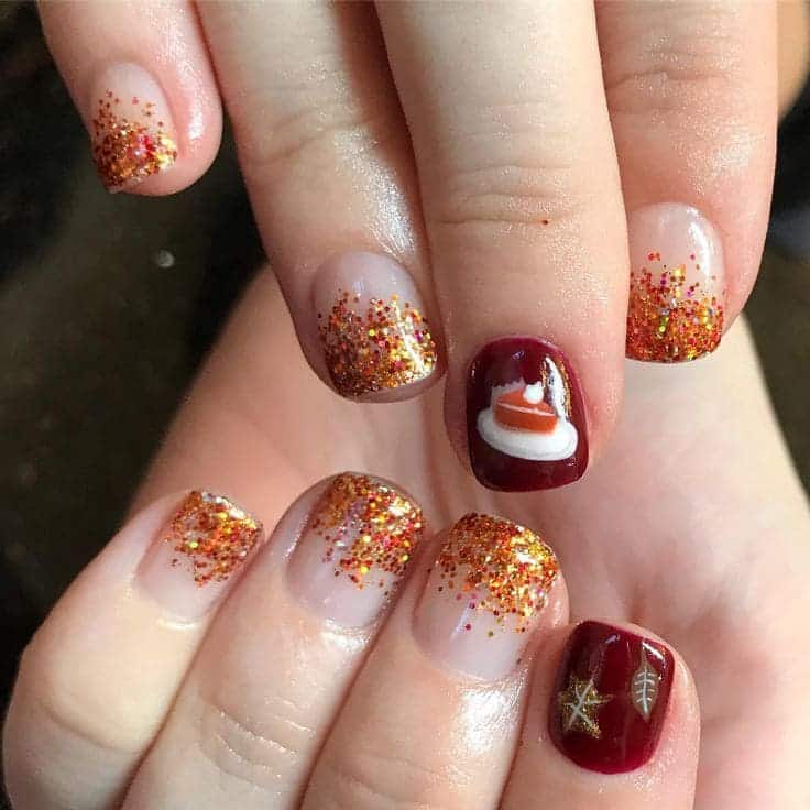 Red and gold glitter pumpkin pie nail art