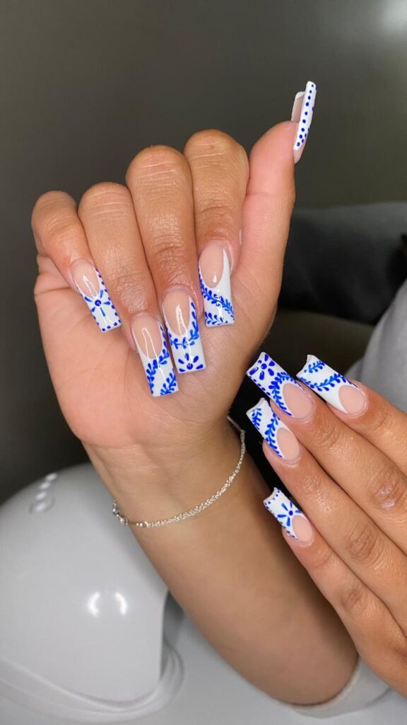 clase azul nails in white and blue floral patterns x clase azul nails in white and blue floral patterns x