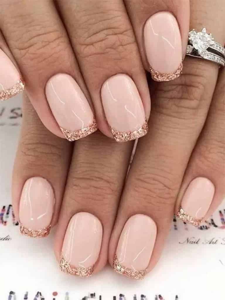 french tips with pink golden glitters on nails x