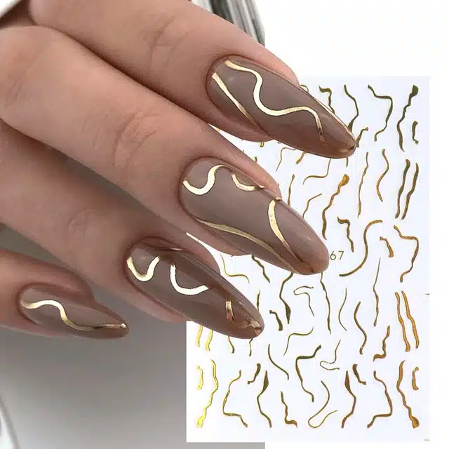 golden metallic stripes on girls hands golden metallic stripes on girls hands