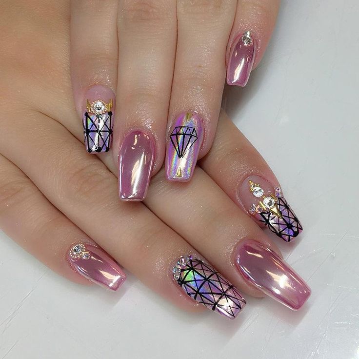 pink chromatic nails with geometric patterns and beads