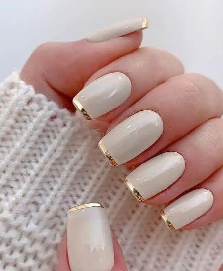 white nail art with golden french tip s white nail art with golden french tip s