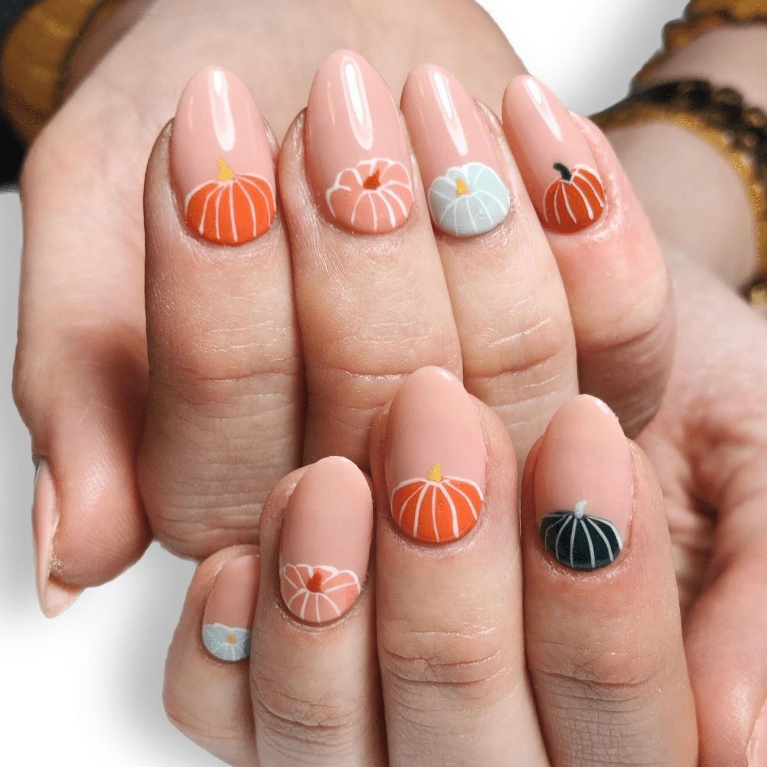 female hands with Pastel Pumpkin Pie Nails 
