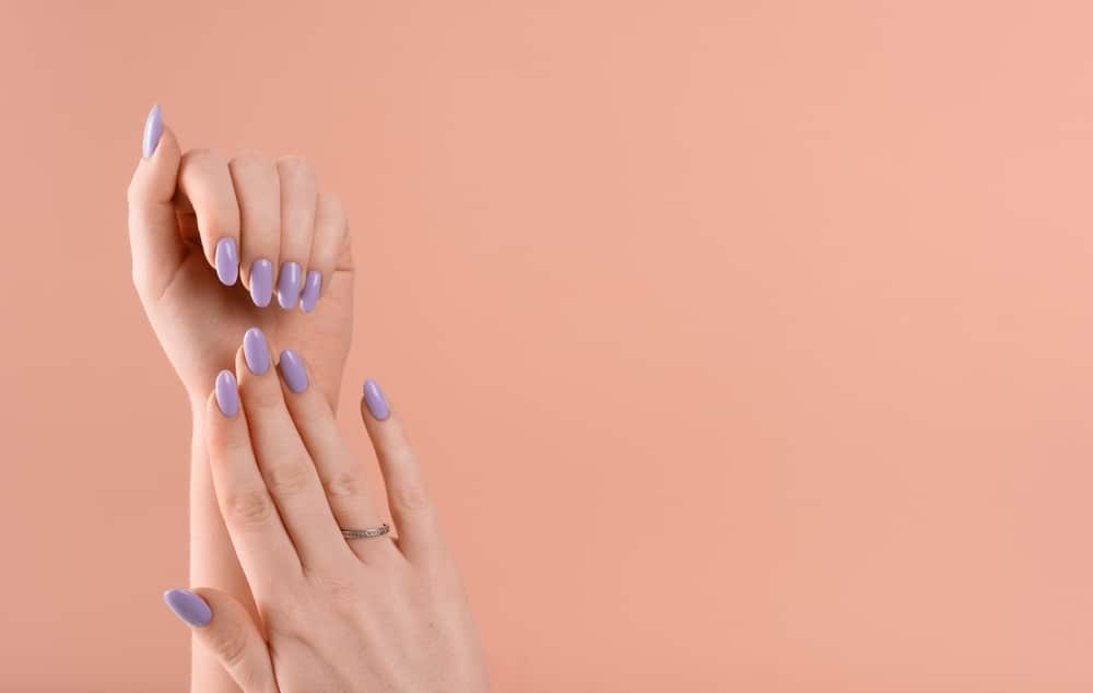 A view of hands with lavender nail colorith Feminine Violet Lavender Nails A view of hands with lavender nail color