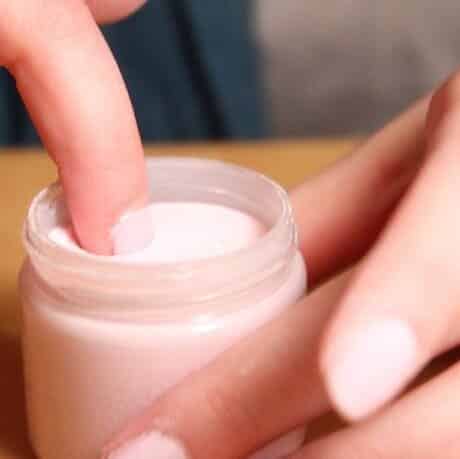 A view of nails dipped in moisturizer A view of nails dipped in moisturizer
