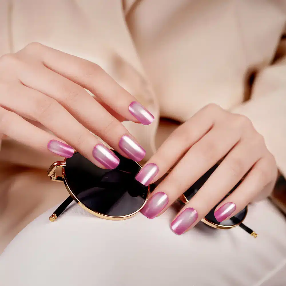 a girl carrying glasses rose radiance chrome nails a girl carrying glasses rose radiance chrome nails