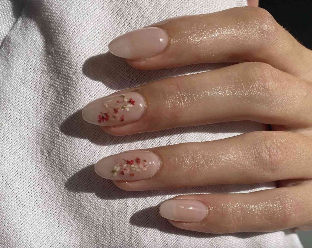 clear nails with florak patterns on two nails x clear nails with florak patterns on two nails x
