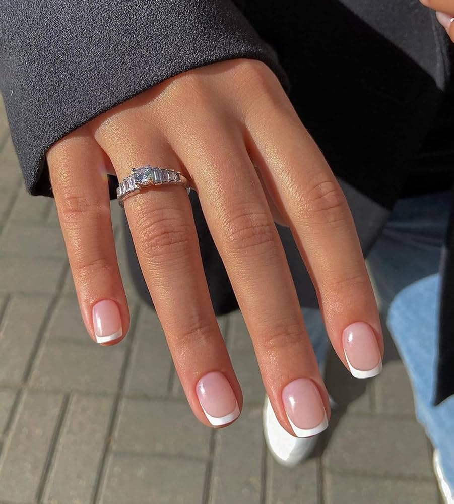 clear nails with french tips girl wearing a ring clear nails with french tips girl wearing a ring
