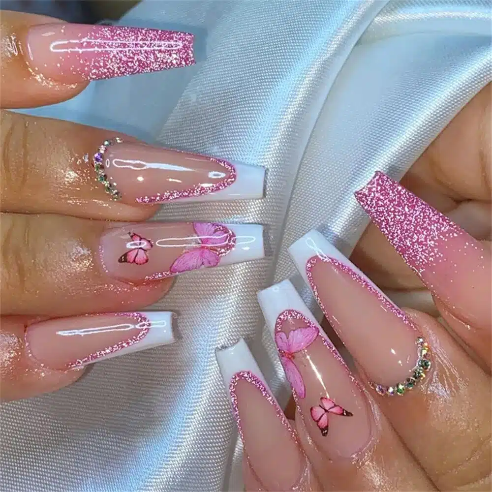 glossy long nails with butterfly patterns glossy long nails with butterfly patterns