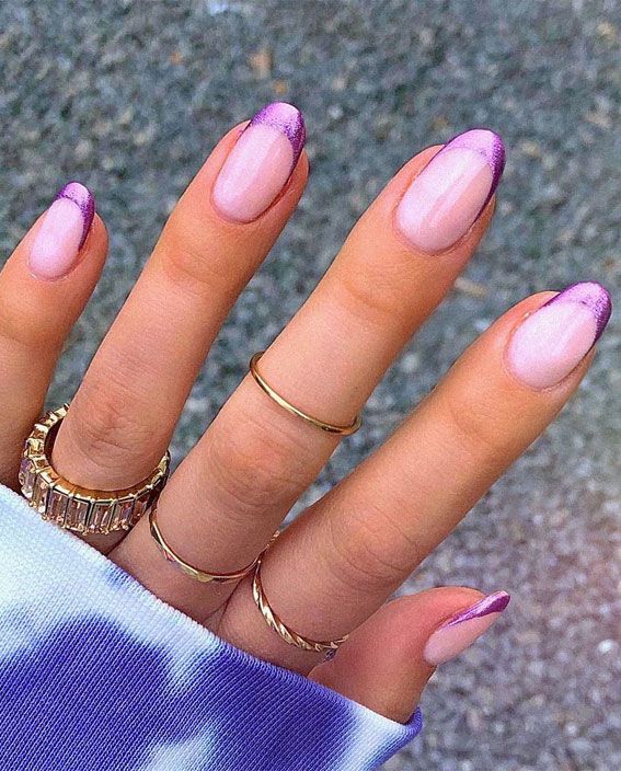 lavender colored chrome tips girl wearing rings lavender colored chrome tips girl wearing rings