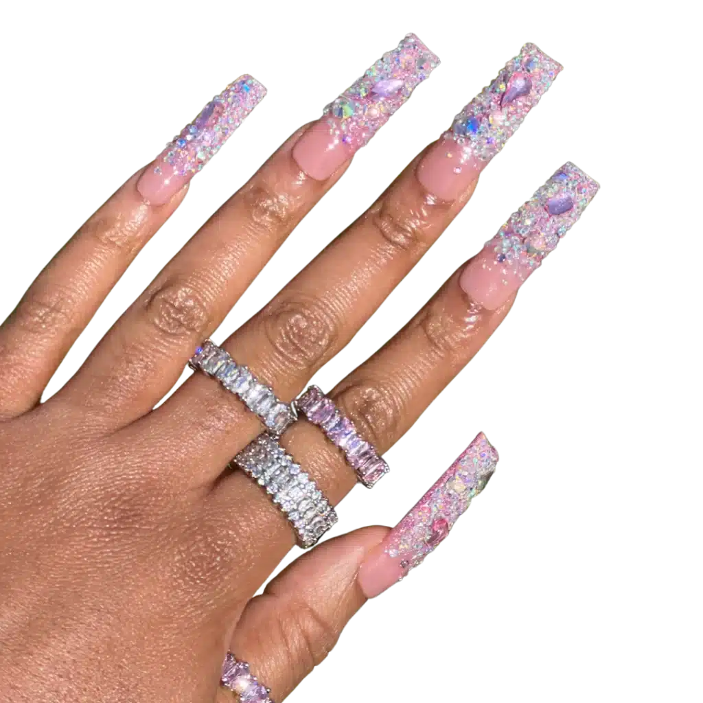 pink colored long nails with beads and embellishments rings on fingers x pink colored long nails with beads and embellishments rings on fingers x