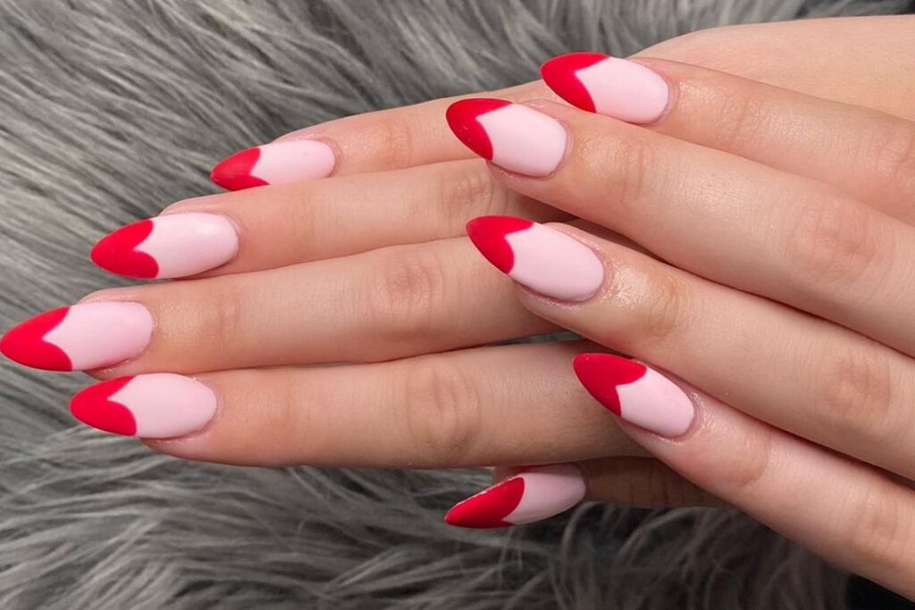 pink nails with red heart shaped tips x pink nails with red heart shaped tips x