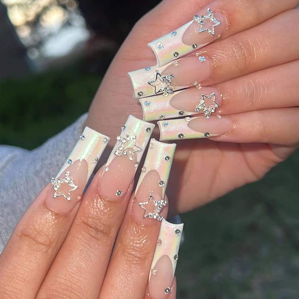 star french tips for long nails in white color and embesllishments star french tips for long nails in white color and embesllishments