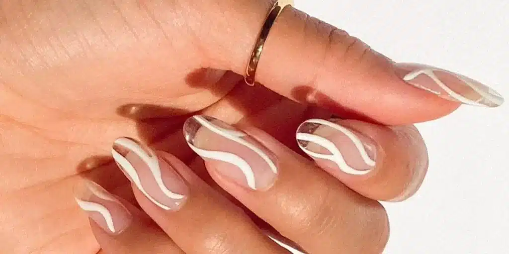white abstract swirls on clear nails x white abstract swirls on clear nails x