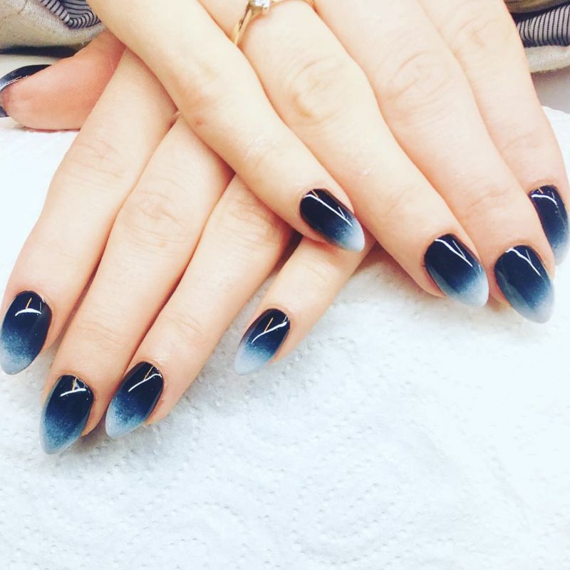 A view of midnight noir ombre nail color A view of midnight noir ombre nail color