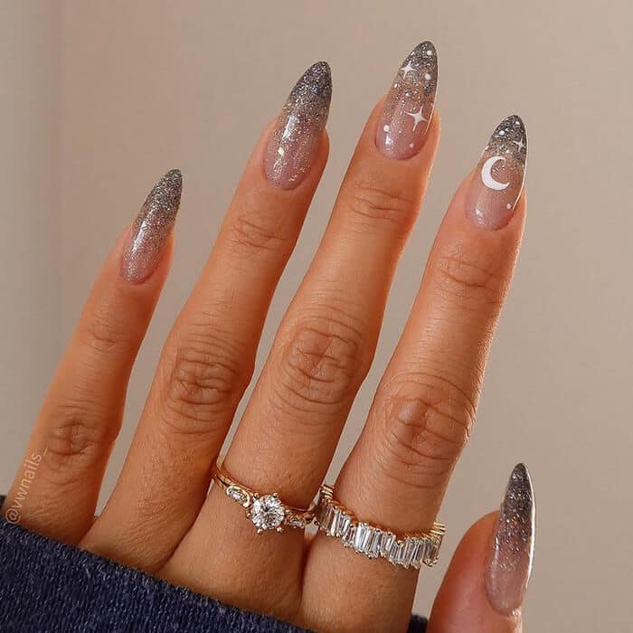 A view of nails with glitter on it A view of nails with glitter on it