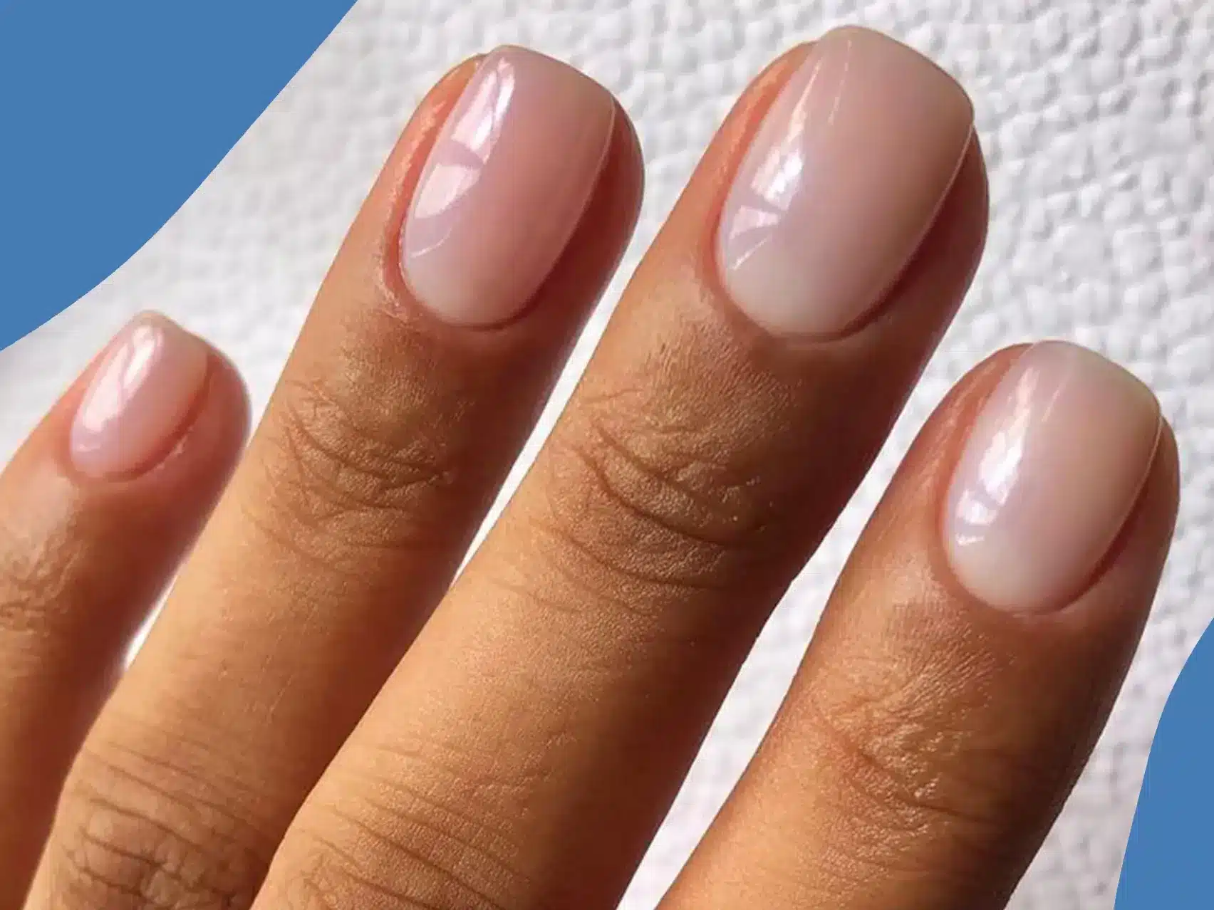 A view of nude nails with glossy top coat A view of nude nails with glossy top coat