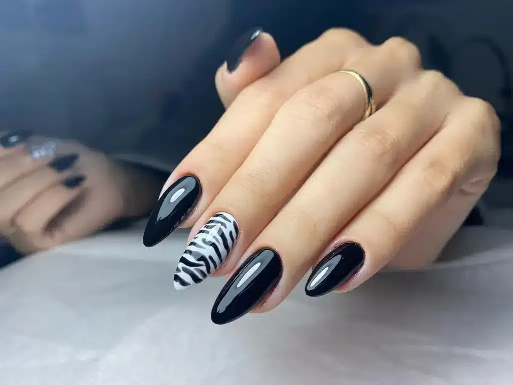 A view of zebra printed gel nails A view of zebra printed gel nails