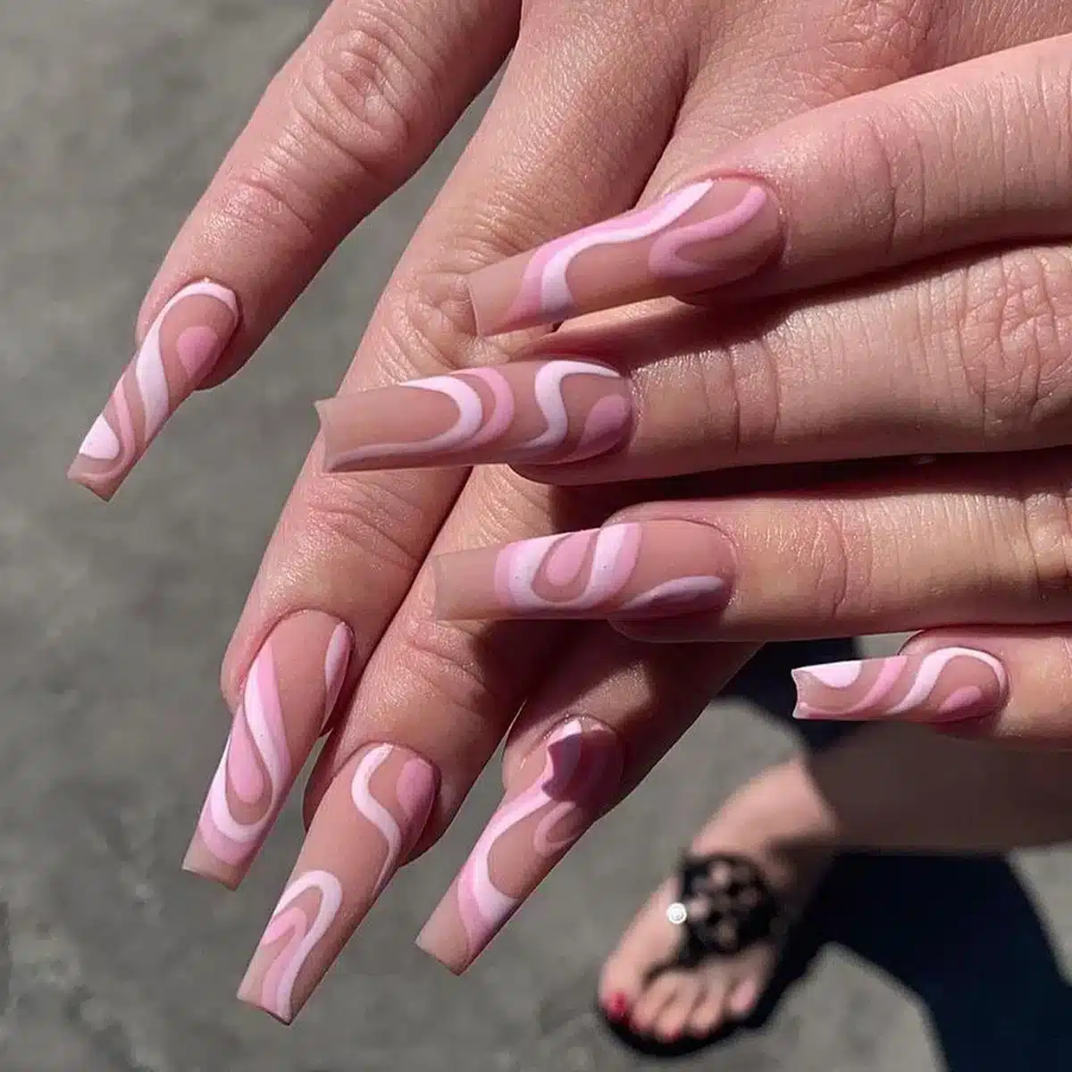 long geometic patterned nails in pink and nude color long geometic patterned nails in pink and nude color