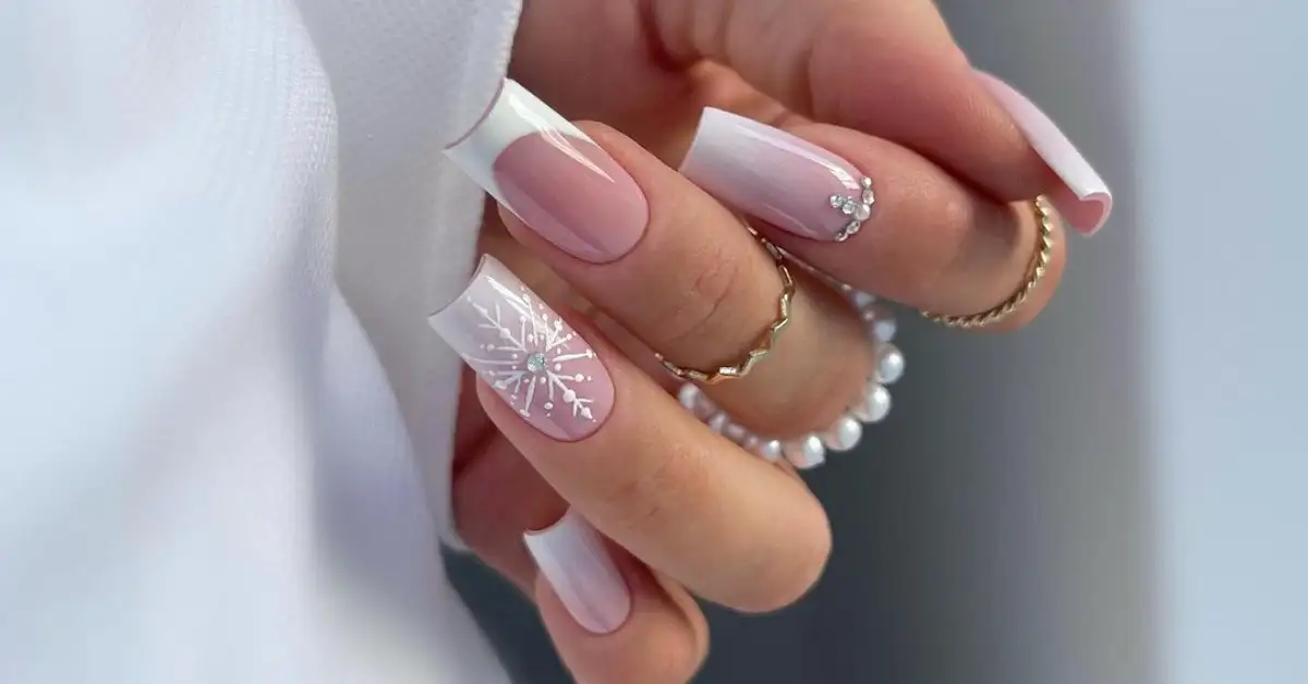 zoomed view of nails adorned with white french tips zoomed view of nails adorned with white french tips