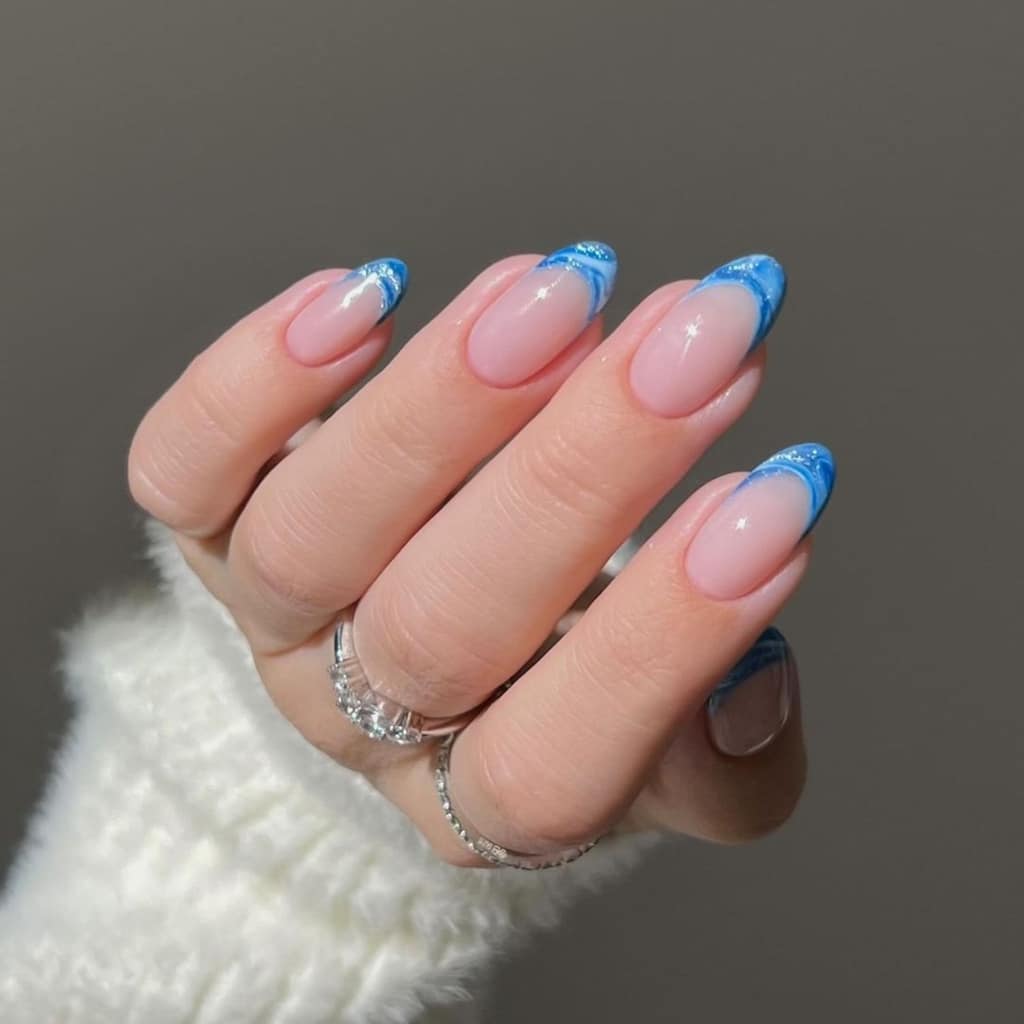 A view of blue marble french tips A view of blue marble french tips