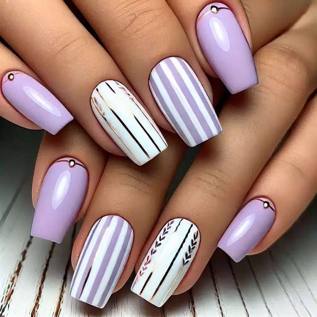 A view of lavender nails with white stripes A view of lavender nails with white stripes