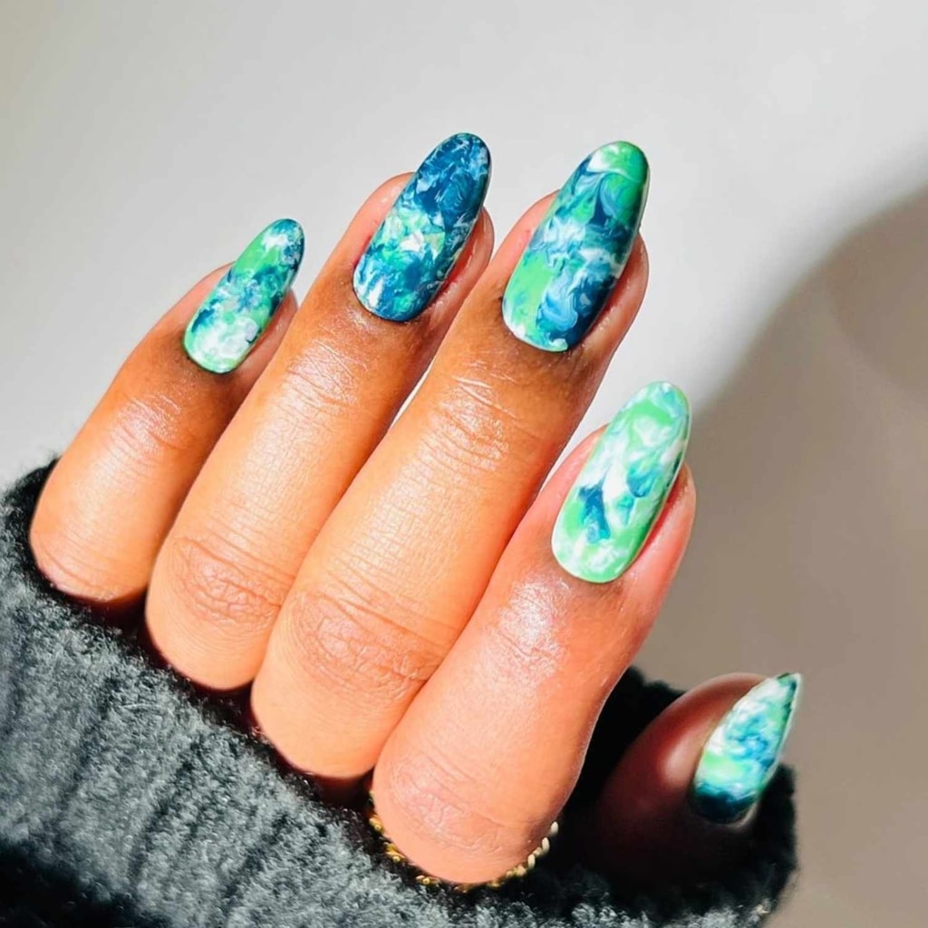 A view of marble nail designs in blue A view of marble nail designs in blue