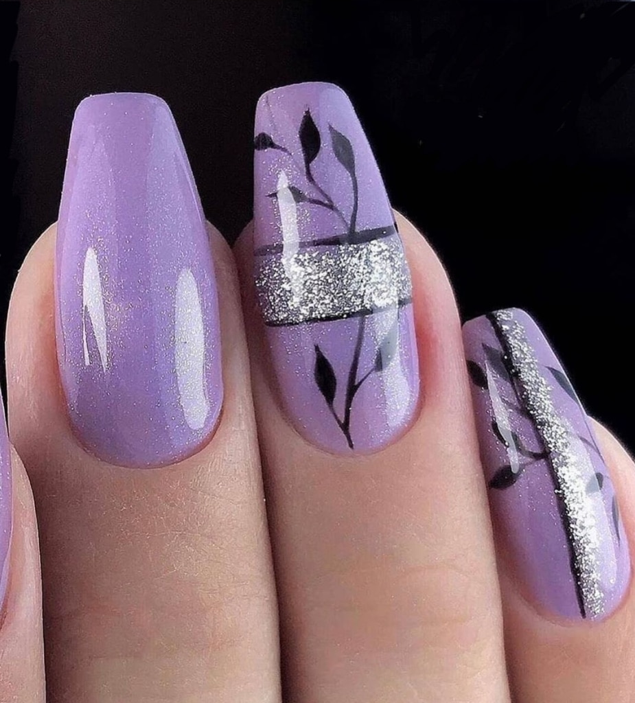 A view of purple nails with silver accent A view of purple nails with silver accent