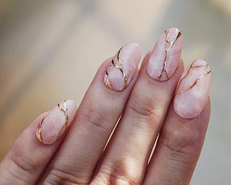 A view of rose gold rose marble nails A view of rose gold rose marble nails