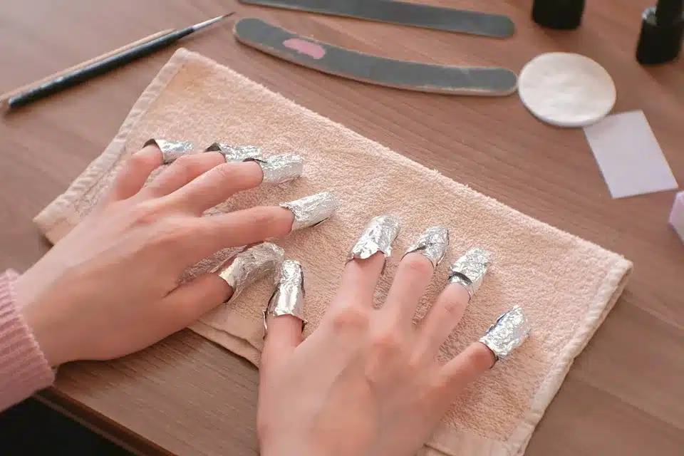 nails covered in aluminum foil nails covered in aluminum foil