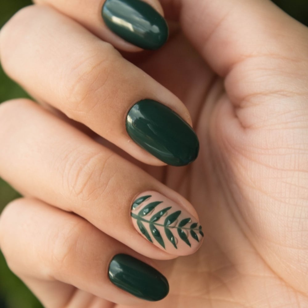 Beautiful womans hands with spring summer floral nail design.