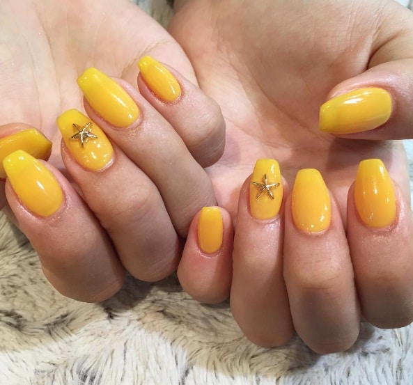 A view of yellow nail color A view of yellow nail color